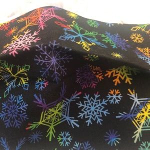 Rainbow snowflake face covers.
